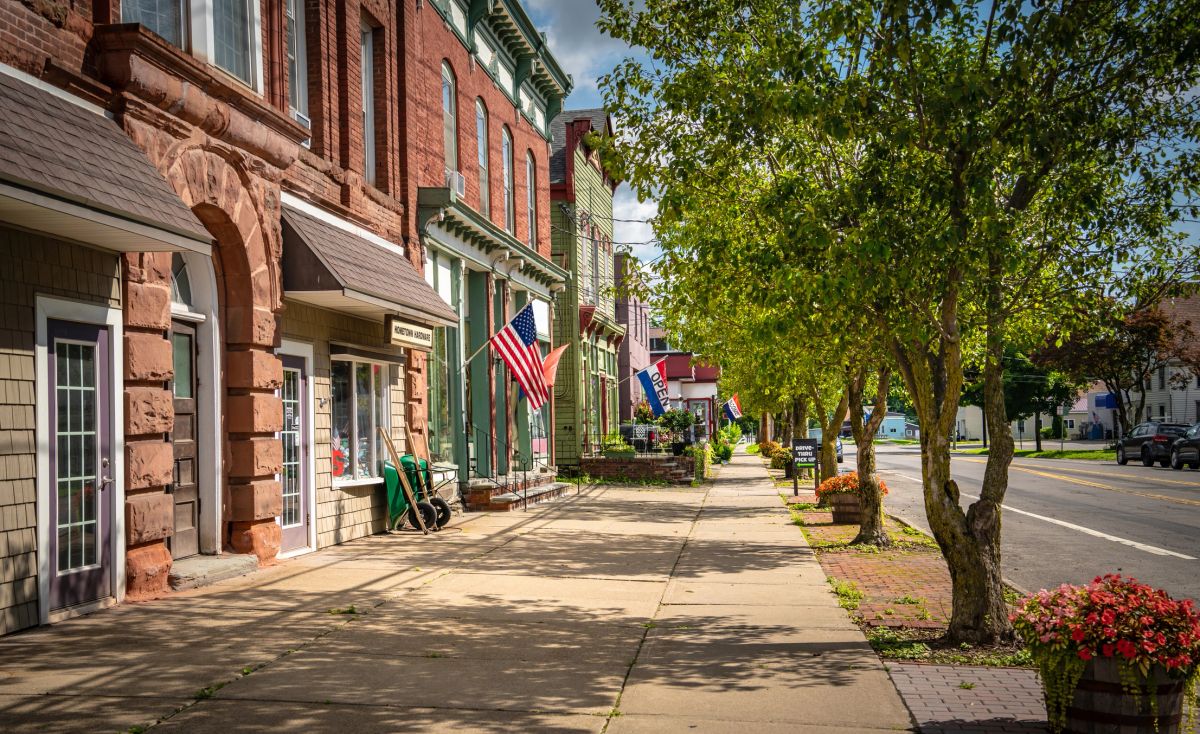 Small-town businesses on a sunny main street